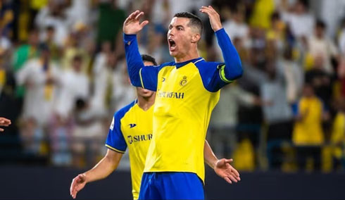 Cristiano Ronaldo motivating Saudi Arabian fans during a game for Al Nassr