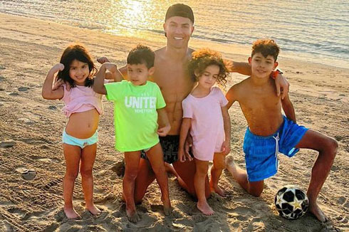 Cristiano Ronaldo on the beach with his sons