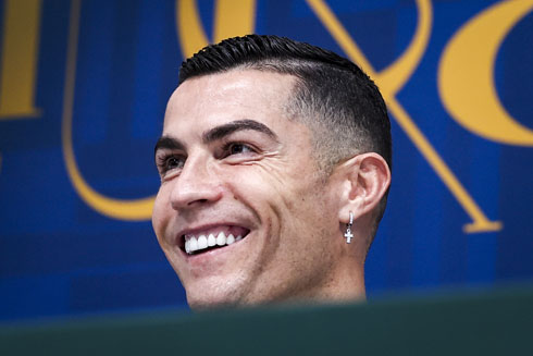 Cristiano Ronaldo happy at a press conference for Al Nassr