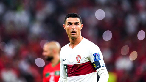 Cristiano Ronaldo playing for Portugal in white uniform