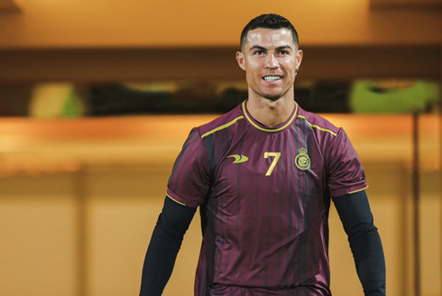 Cristiano Ronaldo in Al Nassr wearing a red shirt