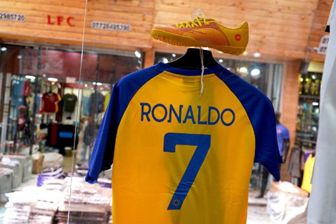 Cristiano Ronaldo and Al Nassr jersey in a shopping