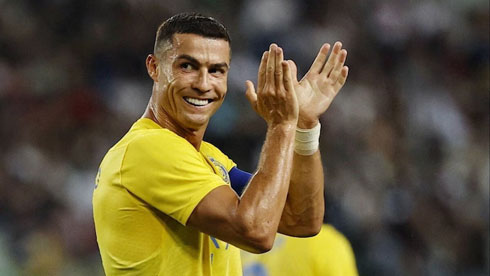 Cristiano Ronaldo cheering his supporters in the stadium