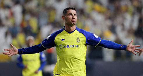 Cristiano Ronaldo opens his arms to celebrate his goal