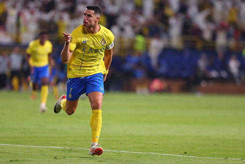 Cristiano Ronaldo runs across the pitch celebrating goal for Al Nassr