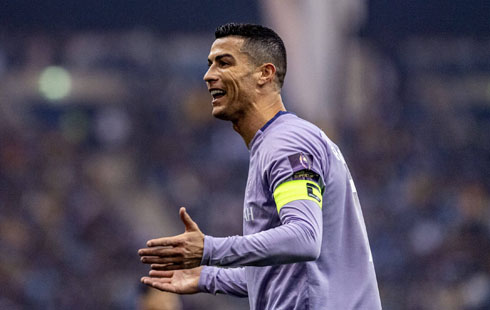 Cristiano Ronaldo in purple shirt for Al Nassr