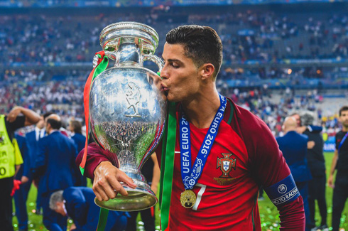 Cristiano Ronaldo kissing the European Championship trophy