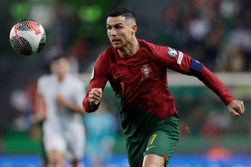 Cristiano Ronaldo chasing the ball bouncing