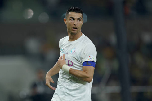 Cristiano Ronaldo playing for Al Nassr wearing white jersey