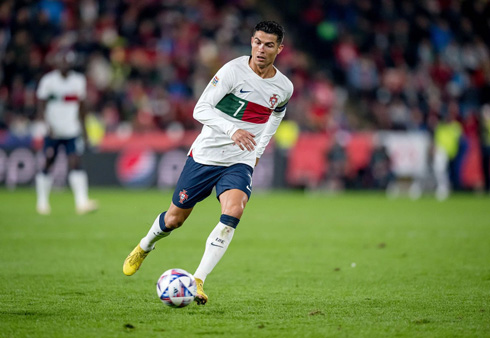 Cristiano Ronaldo playing for Portugal in a white shirt