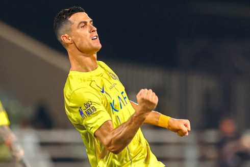 Cristiano Ronaldo yellow shirt at Al Nassr
