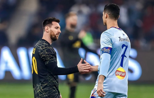 Cristiano Ronaldo and Lionel Messi being friendly