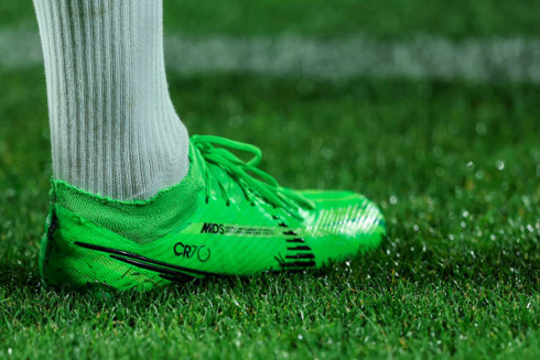 Cristiano Ronaldo green football boots in Al Nassr in 2024