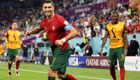 Cristiano Ronaldo next to his Portuguese teammates