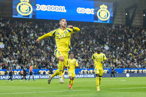 Cristiano Ronaldo runs around and jumps after goal for Al Nassr