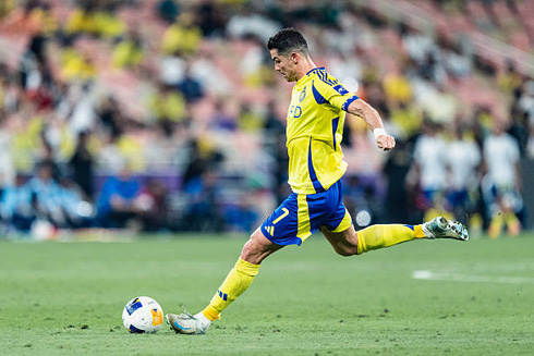 Cristiano Ronaldo kicking the ball for Al Nassr