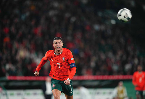 Cristiano Ronaldo chasing the ball in a Portugal game