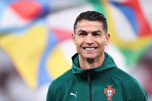 Cristiano Ronaldo smiling in Portugal jacket
