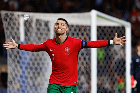 Cristiano Ronaldo arms open after goal for Portugal