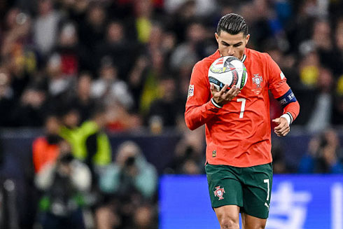 Cristiano Ronaldo kissing the ball in Portugal vs Spain in 2025