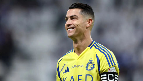 Cristiano Ronaldo smiling at Al Nassr