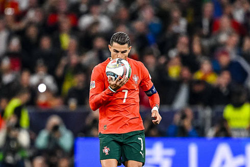 Cristiano Ronaldo kissing the ball