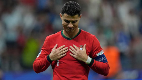 Cristiano Ronaldo with his hands on his chest
