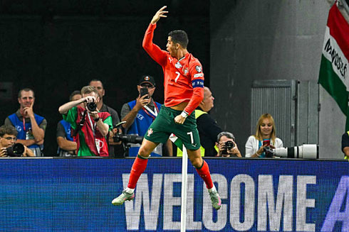 Cristiano Ronaldo celebrates next to the corner flag