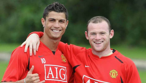 Cristiano Ronaldo in a team photo with Wayne Rooney