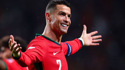 Cristiano Ronaldo opens his arms after scoring