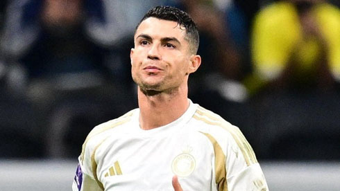 Cristiano Ronaldo in Al Nassr's line up making a funny face