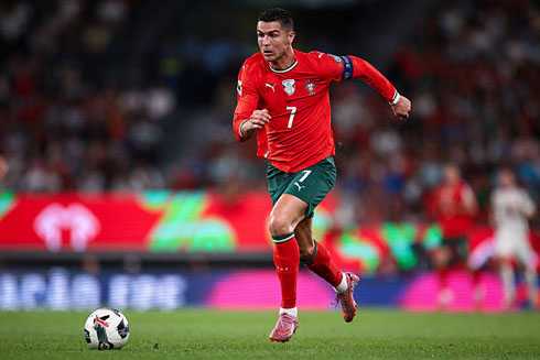 Cristiano Ronaldo running with the ball