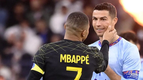 Cristiano Ronaldo and Mbappé talking to each other