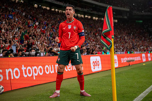 Cristiano Ronaldo scores and celebrates next to the corner flag