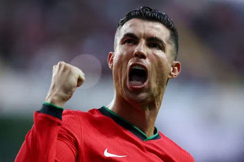 Cristiano Ronaldo scores and raises his fist
