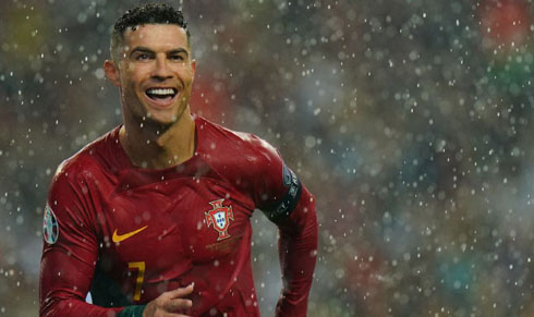 Cristiano Ronaldo under rain playing for Portugal