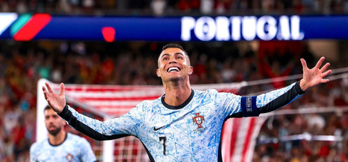 Cristiano Ronaldo in a Portugal blue and white shirt