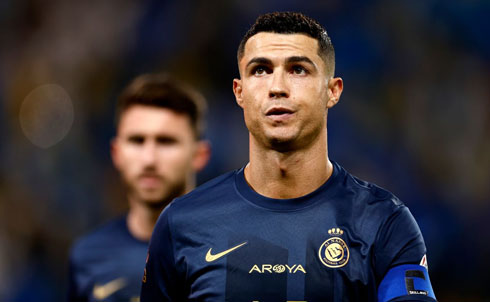 Cristiano Ronaldo serious man in blue shirt