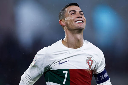 Cristiano Ronaldo happy with Portugal white jersey
