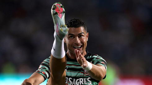 Cristiano Ronaldo stretching his right foot