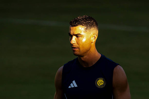 Cristiano Ronaldo half on the sun and half on the shadows