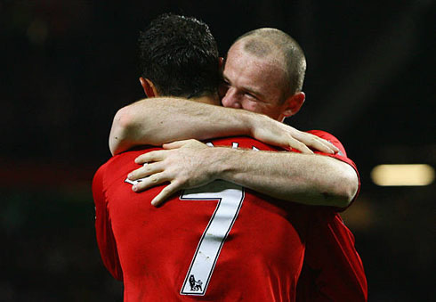 Cristiano Ronaldo hugged by Rooney