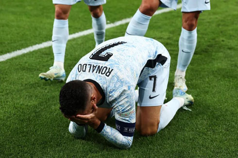 Cristiano Ronaldo crying on the ground