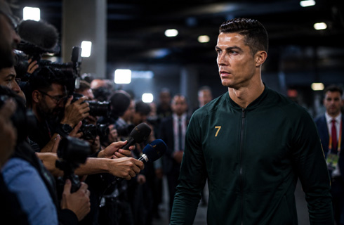 Cristiano Ronaldo walking next to fans