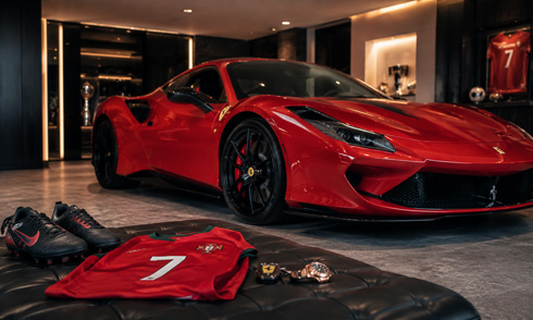 Cristiano Ronaldo and his red Ferrari