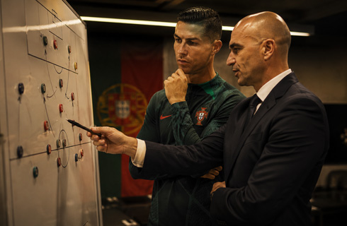 Cristiano Ronaldo and Martinez discussing tactics