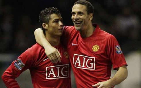 Cristiano Ronaldo being hugged by Rio Ferdinand