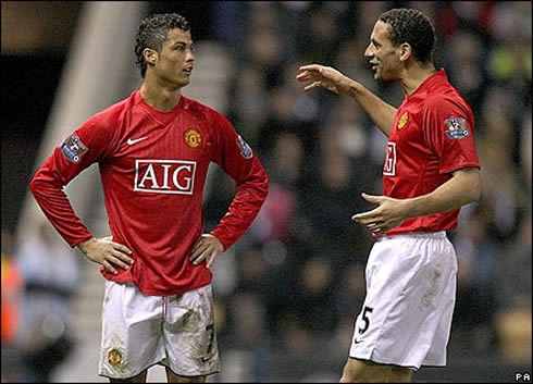 Cristiano Ronaldo listenin to Rio Ferdinand instructions