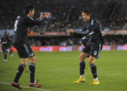 Cristiano Ronaldo and Kaká dancing in a goal celebration for Real Madrid