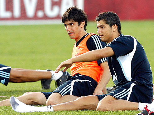 Cristiano Ronaldo and Kaká stretching in a Real Madrid practice session